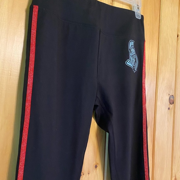 NHL Ottawa Senators Women’s Black Yoga Pants with Red Stripe and Logo - Picture 5 of 6